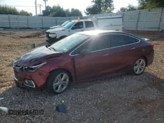 2016 Chevrolet Cruze Premier with VIN 1G1BG5SM1G7305910, listed as a Copart auction lot 86592965 with 127,901 mi miles and Salvage title. Bid and sale history available at DreamBid. Image 1.