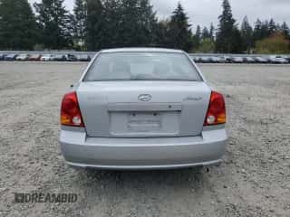 2005 Hyundai Accent GLS z VIN KMHCG45C75U639281, wystawiony jako Copart lot #54887095 z przebiegiem 136 090 mil mil oraz Szkoda całkowita • Salvage title. Historia ofert i sprzedaży dostępna na DreamBid. Obrazek 6.