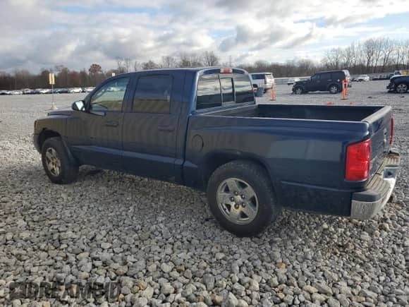 2005 Dodge Dakota SLT z VIN 1D7HE48N25S304783, wystawiony jako Copart lot #79870154 z przebiegiem 205 493 mil mil oraz Czysty tytuł • Clean title. Historia ofert i sprzedaży dostępna na DreamBid. Obrazek 2.