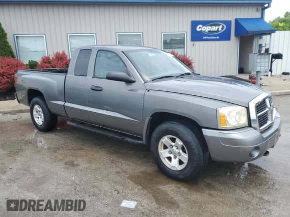 2006 Dodge Dakota SLT with VIN 1D7HW42N26S501704, listed as a Copart auction lot 57629665 with 116,183 mi miles and Salvage title. Bid and sale history available at DreamBid. Image 4.
