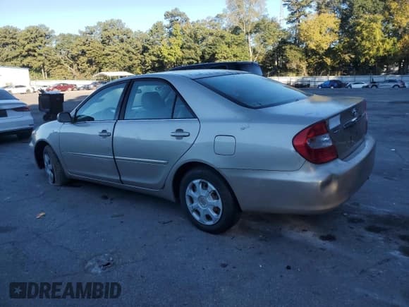 ✅ 2004 Toyota Camry LE • VIN: 4T1BE32K24U270156 • Lot: 82449765. Listed on Copart with 379,512 mi. Free auction sales archive from the USA and detailed vehicle history report at DreamBid. Image 2.