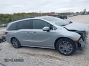 ✅ 2025 Honda Odyssey Touring • VIN: 5FNRL6H89SB011692 • Lot: 43515660. Listed on IAAI with 14,676 mi. Free auction sales archive from the USA and detailed vehicle history report at DreamBid. Image 14.