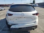 ✅ 2022 Mazda CX-5 2.5 Turbo • VIN: JM3KFBAY0N0606288 • Lot: 70313605. Wystawiony na Copart z przebiegiem 51 363 mil. Bezpłatny archiwum sprzedaży aukcyjnych z USA i szczegółowy raport historii pojazdu na DreamBid. Zdjęcie 6.