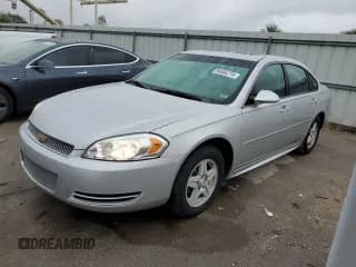 ✅ 2015 Chevrolet Impala LT • VIN: 2G1WB5E32F1142148 • Lot: 90464715. Listed on Copart with 119,341 mi. Free auction sales archive from the USA and detailed vehicle history report at DreamBid. Image 1.