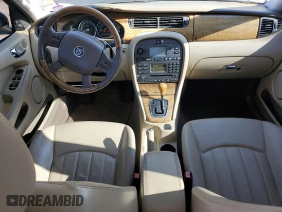 ✅ 2004 Jaguar X-Type • VIN: SAJEA51C84WD98087 • Lot: 80519135. Wystawiony na Copart z przebiegiem 100 758 mil. Bezpłatny archiwum sprzedaży aukcyjnych z USA i szczegółowy raport historii pojazdu na DreamBid. Zdjęcie 8.