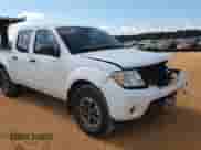 2017 Nissan Frontier Desert Runner with VIN 1N6DD0ER2HN724409, listed as a Copart auction lot 81913815 with 100,445 mi miles and Salvage title. Bid and sale history available at DreamBid. Image 14.
