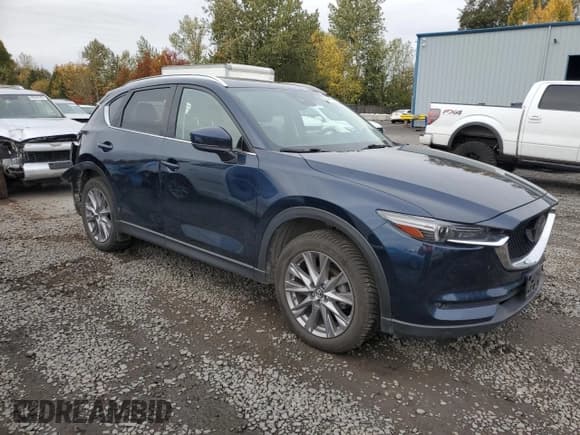 ✅ 2019 Mazda CX-5 Grand Touring • VIN: JM3KFBDM9K0618640 • Lot: 90044765. Listed on Copart with 60,313 mi. Free auction sales archive from the USA and detailed vehicle history report at DreamBid. Image 4.