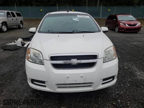 2009 Chevrolet Aveo 1LT z VIN KL1TD56E29B382736, wystawiony jako Copart lot #87038674 z przebiegiem 177 623 mil mil oraz Szkoda całkowita • Salvage title. Historia ofert i sprzedaży dostępna na DreamBid. Obrazek 5.