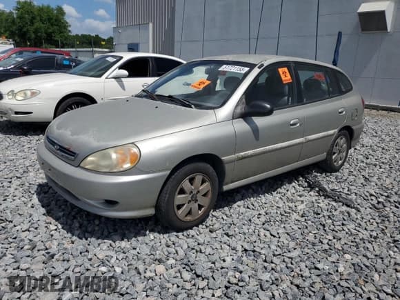 ✅ 2002 Kia Rio • VIN: KNADC163026060437 • Lot: 51721155. Listed on Copart with 98,735 mi. Free auction sales archive from the USA and detailed vehicle history report at DreamBid. Image 1.