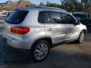 ✅ 2012 Volkswagen Tiguan LE • VIN: WVGAV7AX2CW580035 • Lot: 47297205. Listed on Copart with 118,211 mi. Free auction sales archive from the USA and detailed vehicle history report at DreamBid. Image 3.