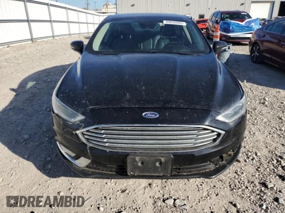 ✅ 2017 Ford Fusion Hybrid Titanium • VIN: 3FA6P0RU8HR113952 • Lot: 89856085. Wystawiony na Copart z przebiegiem Nie podano. Bezpłatny archiwum sprzedaży aukcyjnych z USA i szczegółowy raport historii pojazdu na DreamBid. Zdjęcie 5.