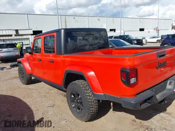 ✅ 2023 Jeep Gladiator Willys • VIN: 1C6HJTAG5PL589947 • Лот: 43263399. Опубликован ранее на IAAI с пробегом 12 549 миль. Бесплатный доступ к архиву аукционных продаж из США и подробный отчёт об истории автомобиля на DreamBid. Изображение 3.