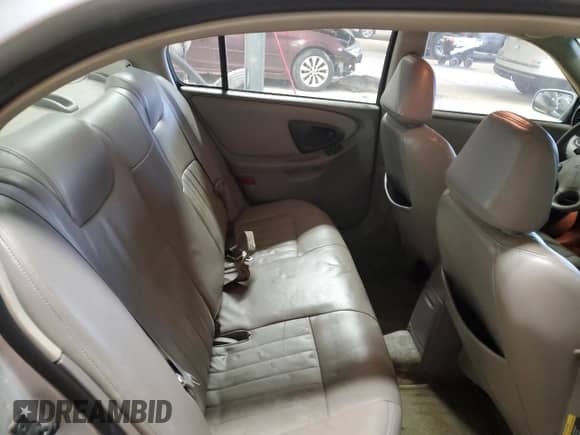 2003 Chevrolet Malibu LS z VIN 1G1NE52J73M584901, wystawiony jako Copart lot #88965645 z przebiegiem 193 545 mil mil oraz Czysty tytuł • Clean title. Historia ofert i sprzedaży dostępna na DreamBid. Obrazek 10.