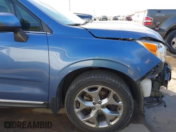 ✅ 2016 Subaru Forester Touring • VIN: JF2SJAXC4GH548334 • Lot: 43258546. Listed on IAAI with 84,361 mi. Free auction sales archive from the USA and detailed vehicle history report at DreamBid. Image 19.