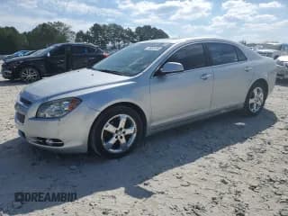 ✅ 2012 Chevrolet Malibu LTZ • VIN: 1G1ZG5E75CF144546 • Lot: 74929754. Listed on Copart with 157,902 mi. Free auction sales archive from the USA and detailed vehicle history report at DreamBid. Image 1.