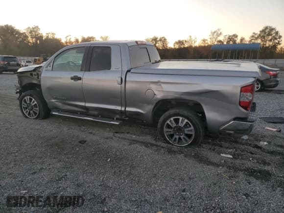 ✅ 2018 Toyota Tundra SR • VIN: 5TFRM5F16JX127725 • Lot: 91208775. Listed on Copart with 252,572 mi. Free auction sales archive from the USA and detailed vehicle history report at DreamBid. Image 2.