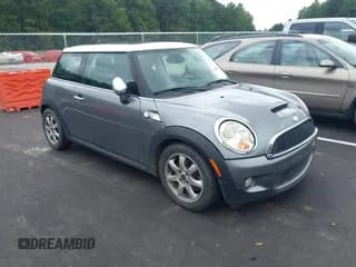 ✅ 2009 MINI Hardtop S • VIN: WMWMF73529TW84266 • Lot: 43028809. Listed on IAAI with 105,196 mi. Free auction sales archive from the USA and detailed vehicle history report at DreamBid. Image 1.