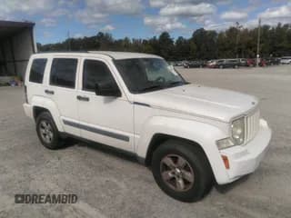✅ 2010 Jeep Liberty Sport • VIN: 1J4PN2GKXAW133005 • Lot: 43344307. Listed on IAAI with 241,355 mi. Free auction sales archive from the USA and detailed vehicle history report at DreamBid. Image 1.