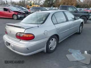 2000 Chevrolet Malibu LS z VIN 1G1NE52J6Y6164901, wystawiony jako IAAI lot #41383022 z przebiegiem 47 334 mil mil oraz . Historia ofert i sprzedaży dostępna na DreamBid. Obrazek 4.