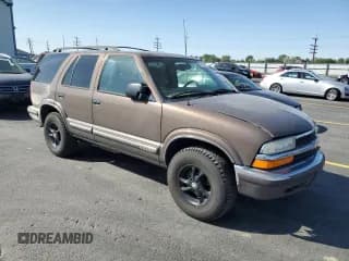 ✅ 1999 Chevrolet Blazer Trailblazer • VIN: 1GNDT13WXX2197828 • Lot: 59288555. Wystawiony na Copart z przebiegiem 180 287 mil. Bezpłatny archiwum sprzedaży aukcyjnych z USA i szczegółowy raport historii pojazdu na DreamBid. Zdjęcie 4.