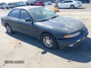 ✅ 1994 Mitsubishi Galant ES • VIN: 4A3AJ56G8RE047552 • Lot: 42655832. Wystawiony na IAAI z przebiegiem 144 164 mil. Bezpłatny archiwum sprzedaży aukcyjnych z USA i szczegółowy raport historii pojazdu na DreamBid. Zdjęcie 1.