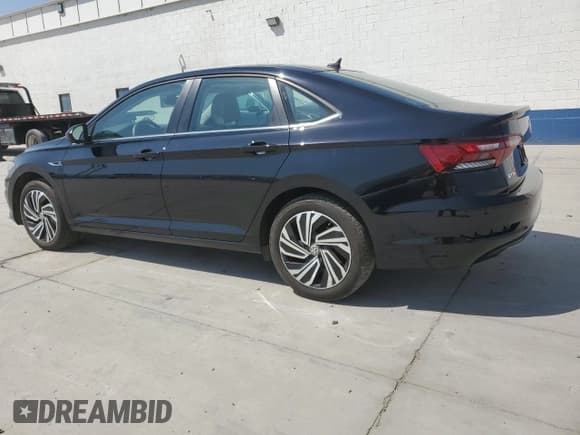 ✅ 2021 Volkswagen Jetta SEL • VIN: 3VWE57BU5MM013374 • Лот: 65150905. Опубликован ранее на Copart с пробегом 50 969 миль. Бесплатный доступ к архиву аукционных продаж из США и подробный отчёт об истории автомобиля на DreamBid. Изображение 2.