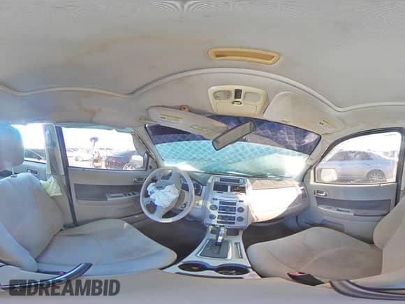 2011 Mercury Mariner z VIN 4M2CN8B76BKJ01102, wystawiony jako Copart lot #88304515 z przebiegiem 109 684 mil mil oraz Szkoda całkowita • Salvage title. Historia ofert i sprzedaży dostępna na DreamBid. Obrazek 14.