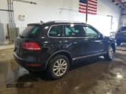 ✅ 2013 Volkswagen Touareg Lux • VIN: WVGEF9BP7DD007945 • Lot: 65758255. Listed on Copart with 90,086 mi. Free auction sales archive from the USA and detailed vehicle history report at DreamBid. Image 3.