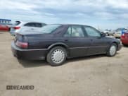 ✅ 1992 Cadillac Seville • VIN: 1G6KY53BXNU804126 • Lot: 69219394. Listed on Copart with 100,647 mi. Free auction sales archive from the USA and detailed vehicle history report at DreamBid. Image 3.