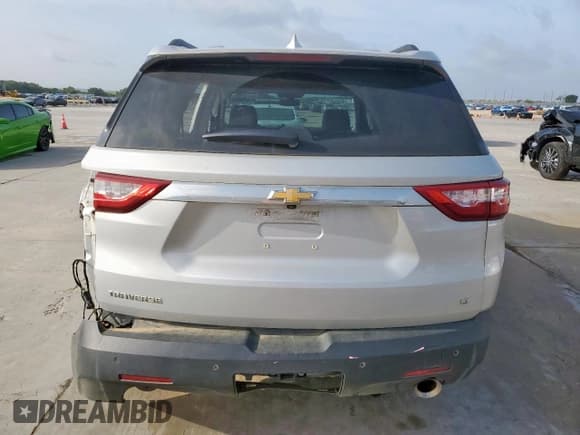 ✅ 2021 Chevrolet Traverse LT • VIN: 1GNERHKW5MJ258677 • Lot: 64280595. Wystawiony na Copart z przebiegiem 37 506 mil. Bezpłatny archiwum sprzedaży aukcyjnych z USA i szczegółowy raport historii pojazdu na DreamBid. Zdjęcie 6.