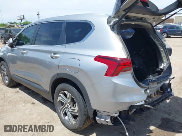 ✅ 2022 Hyundai Santa Fe SE • VIN: 5NMS14AJ7NH393037 • Lot: 42276818. Listed on IAAI with 77,656 mi. Free auction sales archive from the USA and detailed vehicle history report at DreamBid. Image 3.