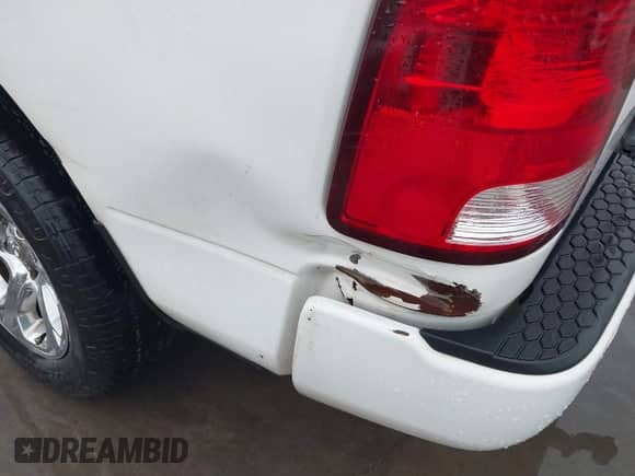 2013 Ram 1500 Express z VIN 3C6JR6ATXDG508202, wystawiony jako IAAI lot #43296958 z przebiegiem 145 380 mil mil oraz . Historia ofert i sprzedaży dostępna na DreamBid. Obrazek 20.