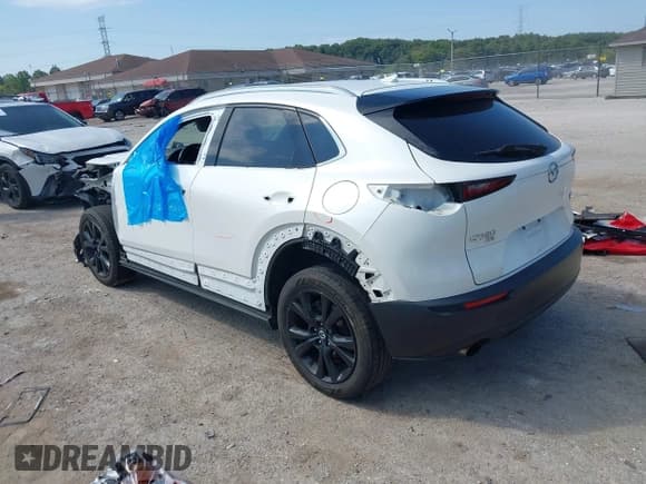 ✅ 2021 Mazda CX-30 Premium • VIN: 3MVDMBDY9MM305371 • Lot: 43203801. Listed on IAAI with 60,632 mi. Free auction sales archive from the USA and detailed vehicle history report at DreamBid. Image 3.