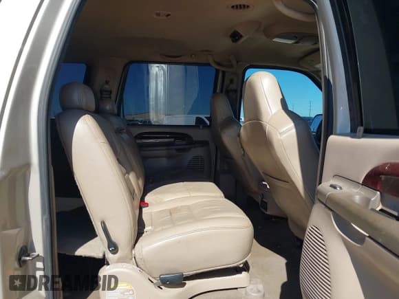 ✅ 2004 Ford Excursion Limited • VIN: 1FMNU43SX4EB57487 • Lot: 43455706. Listed on IAAI with 310,247 mi. Free auction sales archive from the USA and detailed vehicle history report at DreamBid. Image 8.
