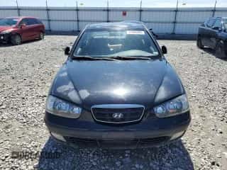 2003 Hyundai Elantra GLS z VIN KMHDN45D43U699230, wystawiony jako Copart lot #68822534 z przebiegiem 160 821 mil mil oraz Nie do naprawy • Non repairable. Historia ofert i sprzedaży dostępna na DreamBid. Obrazek 5.