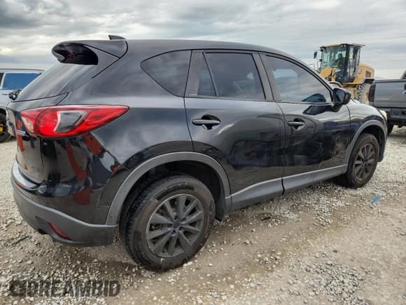 ✅ 2013 Mazda CX-5 Touring • VIN: JM3KE4CE4D0124424 • Lot: 92323325. Listed on Copart with 197,582 mi. Free auction sales archive from the USA and detailed vehicle history report at DreamBid. Image 3.