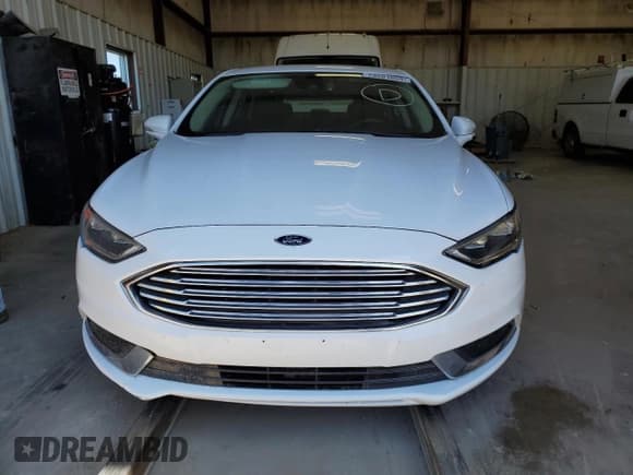 ✅ 2018 Ford Fusion SE • VIN: 3FA6P0LUXJR118844 • Lot: 73201664. Wystawiony na Copart z przebiegiem 135 031 mil. Bezpłatny archiwum sprzedaży aukcyjnych z USA i szczegółowy raport historii pojazdu na DreamBid. Zdjęcie 5.