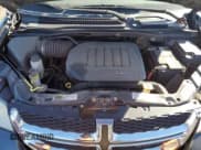 ✅ 2014 Dodge Grand Caravan SE • VIN: 2C4RDGBG1ER389808 • Lot: 86873415. Listed on Copart with 172,800 mi. Free auction sales archive from the USA and detailed vehicle history report at DreamBid. Image 12.