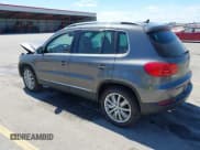 ✅ 2014 Volkswagen Tiguan S • VIN: WVGBV3AXXEW607031 • Lot: 43091792. Listed on IAAI with 139,222 mi. Free auction sales archive from the USA and detailed vehicle history report at DreamBid. Image 3.