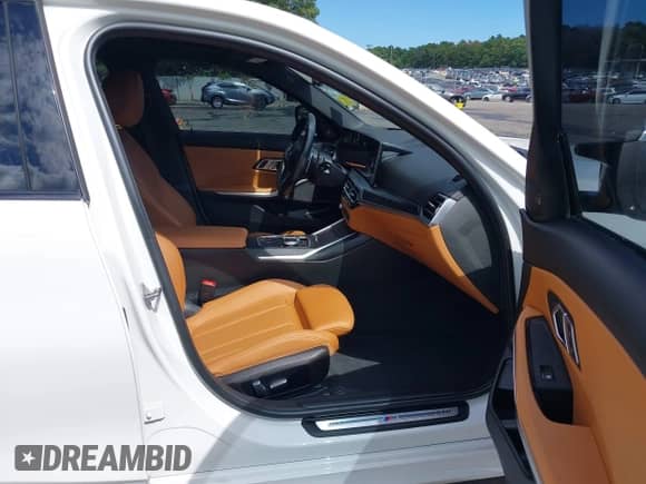 2023 BMW 3 Series M340i with VIN 3MW49FS00P8D11321, listed as a IAAI auction lot 42794821 with 46,037 mi miles and . Bid and sale history available at DreamBid. Image 5.