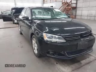✅ 2014 Volkswagen Jetta TDI w/Premium • VIN: 3VWLL7AJ6EM404832 • Lot: 43102412. Listed on IAAI with 73,684 mi. Free auction sales archive from the USA and detailed vehicle history report at DreamBid. Image 1.