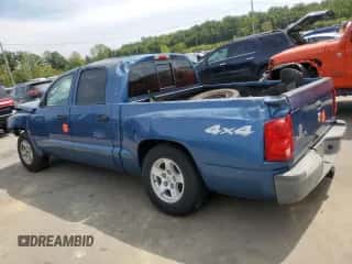 2005 Dodge Dakota ST z VIN 1D7HW28K85S168893, wystawiony jako Copart lot #69955454 z przebiegiem Nie podano mil oraz Szkoda całkowita • Salvage title. Historia ofert i sprzedaży dostępna na DreamBid. Obrazek 2.