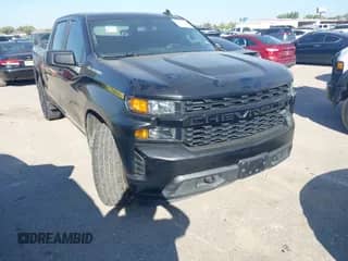 2021 Chevrolet Silverado 1500 Custom z VIN 3GCPYBEK2MG185408, wystawiony jako IAAI lot #43356582 z przebiegiem 98 706 mil mil oraz . Historia ofert i sprzedaży dostępna na DreamBid. Obrazek 1.