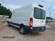 ✅ 2020 Ford Transit Cargo • VIN: 1FTBR1C89LKA80798 • Lot: 42123344. Listed on IAAI with 64,773 mi. Free auction sales archive from the USA and detailed vehicle history report at DreamBid. Image 3.