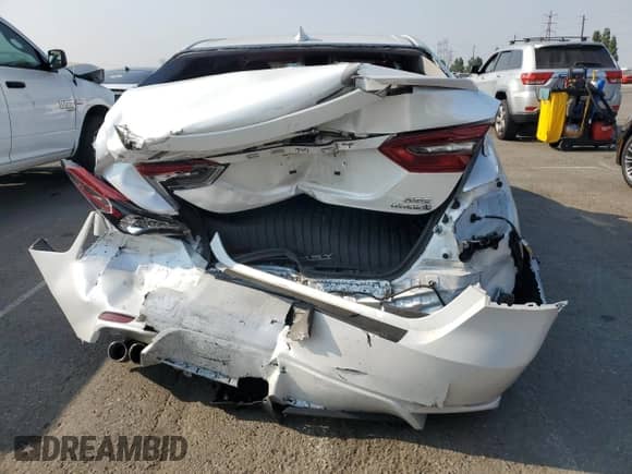 2021 Toyota Camry Hybrid XSE с VIN 4T1K31AKXMU548944, выставлен на аукционе Copart как лот 68894265 с пробегом 81 648 миль миль и Списание • Salvage title. История ставок и продаж доступна на DreamBid. Изображение 6.