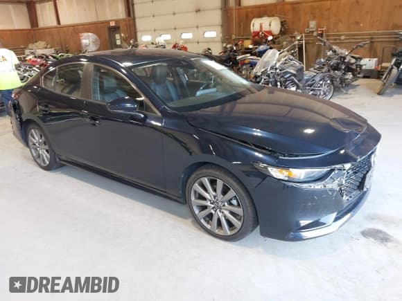✅ 2021 Mazda 3 Preferred • VIN: JM1BPBCL7M1334712 • Lot: 43160500. Listed on IAAI with 57,546 mi. Free auction sales archive from the USA and detailed vehicle history report at DreamBid. Image 1.