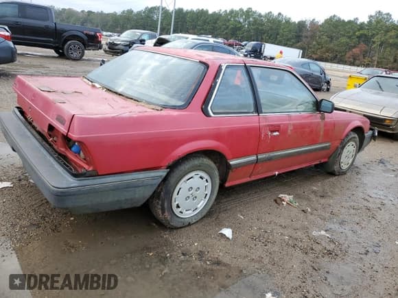 ✅ 1985 Honda Prelude • VIN: JHMAB5221FC800449 • Lot: 84153684. Listed on Copart with Not provided. Free auction sales archive from the USA and detailed vehicle history report at DreamBid. Image 3.