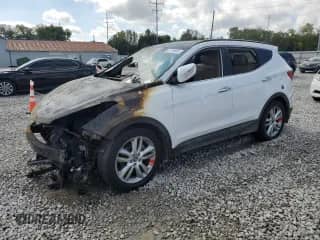 2014 Hyundai Santa Fe с VIN 5XYZU3LA4EG159879, выставлен на аукционе Copart как лот 81749865 с пробегом Не указан миль и Списание • Salvage title. История ставок и продаж доступна на DreamBid. Изображение 1.