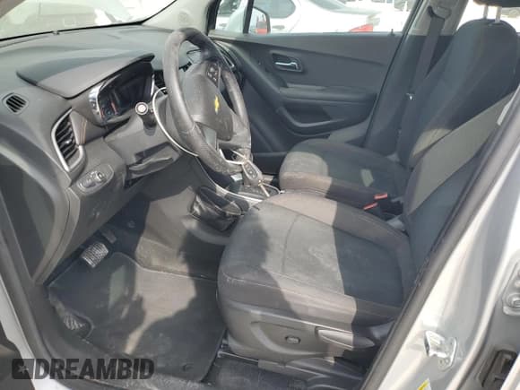 ✅ 2021 Chevrolet Trax LS • VIN: KL7CJKSB4MB324015 • Lot: 89659165. Listed on Copart with 84,756 mi. Free auction sales archive from the USA and detailed vehicle history report at DreamBid. Image 7.