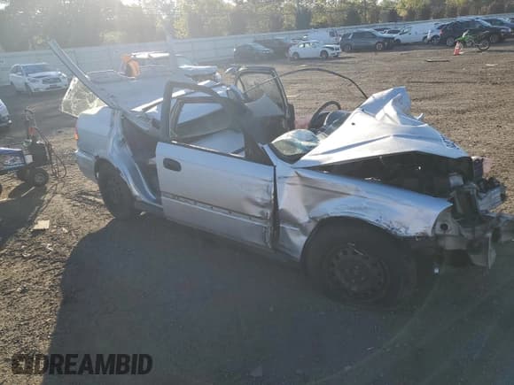 ✅ 1998 Honda Civic DX • VIN: 2HGEJ6625WH535233 • Lot: 84478615. Listed on Copart with 185,587 mi. Free auction sales archive from the USA and detailed vehicle history report at DreamBid. Image 4.